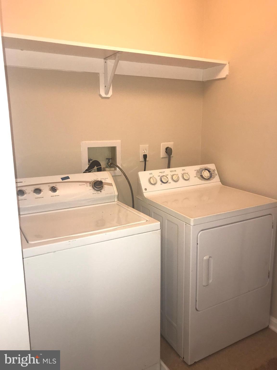 8657 Ritchboro Road District Heights, MD 20747 - Photo 16 of 23 a utility room with dryer and washer