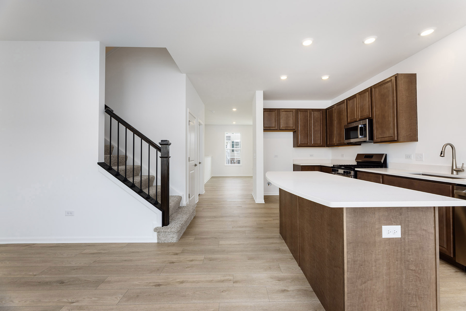 1703 Neubauer Circle Lindenhurst, IL 60046 - Photo 12 of 37 a large kitchen with stainless steel appliances lots of counter top space and cabinets