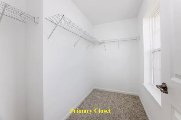 a view of a room with racks on the wall