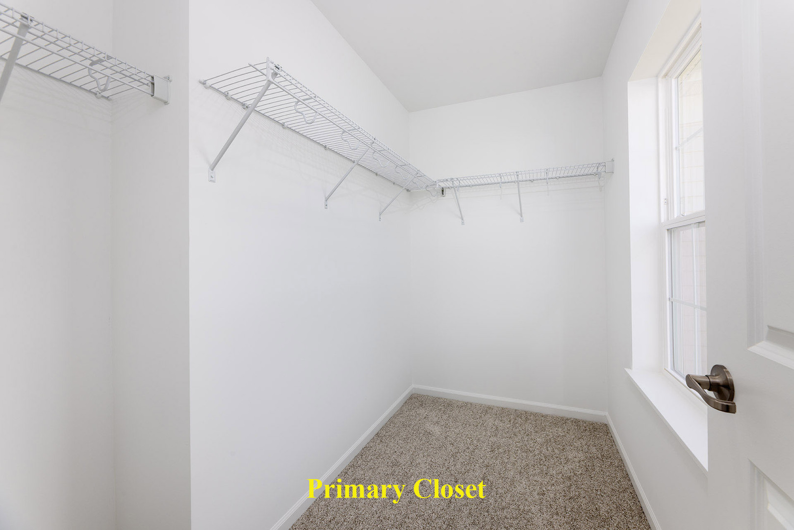 1703 Neubauer Circle Lindenhurst, IL 60046 - Photo 26 of 37 a view of a room with racks on the wall
