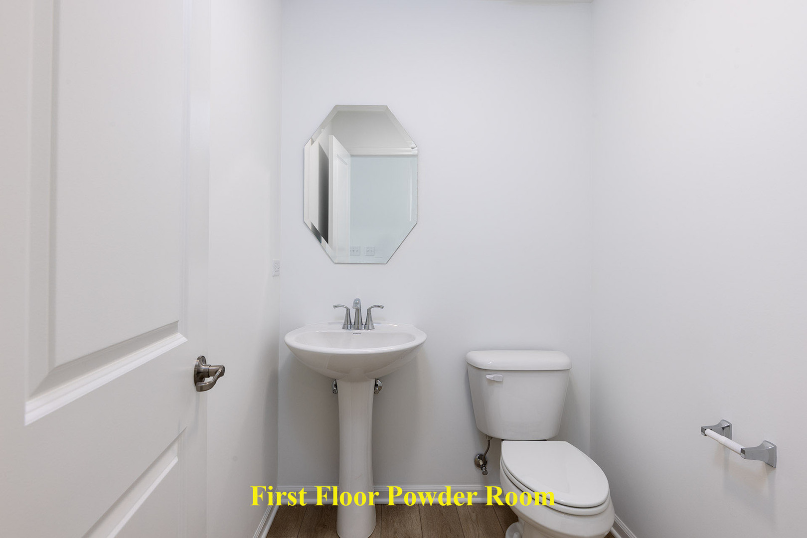 1703 Neubauer Circle Lindenhurst, IL 60046 - Photo 10 of 37 a bathroom with a toilet sink and mirror