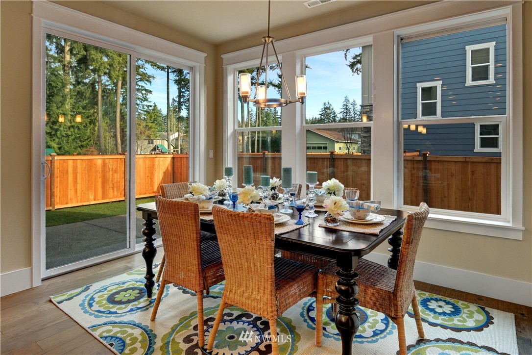 329 Field Place Southeast Renton, WA 98059 - Photo 11 of 19 a view of a dining room with furniture window and outside view