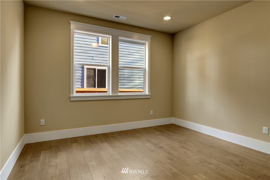 329 Field Place Southeast Renton, WA 98059 - Photo 15 of 19 an empty room with a window