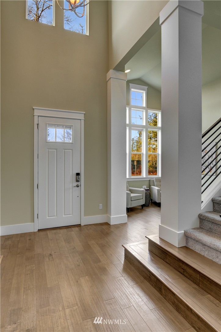 329 Field Place Southeast Renton, WA 98059 - Photo 4 of 19 a view of a livingroom with furniture and window