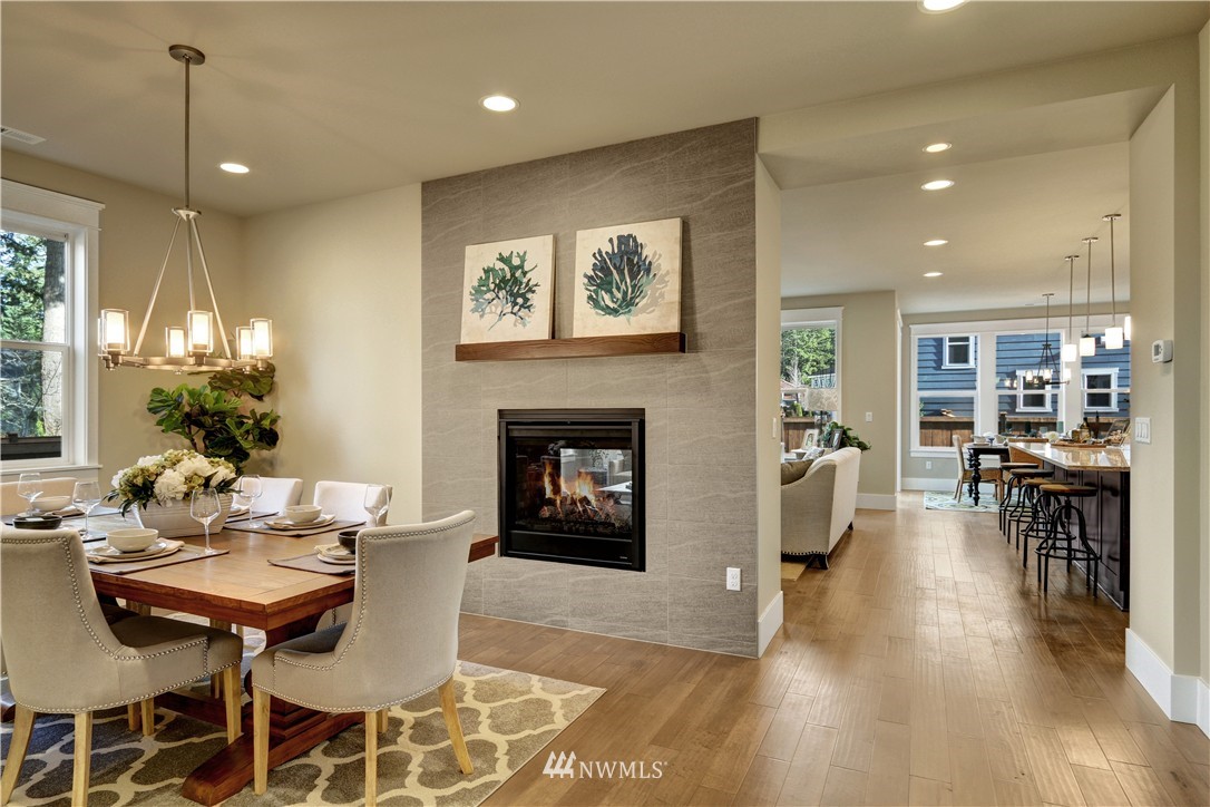 329 Field Place Southeast Renton, WA 98059 - Photo 6 of 19 a living room with furniture a table and a fireplace