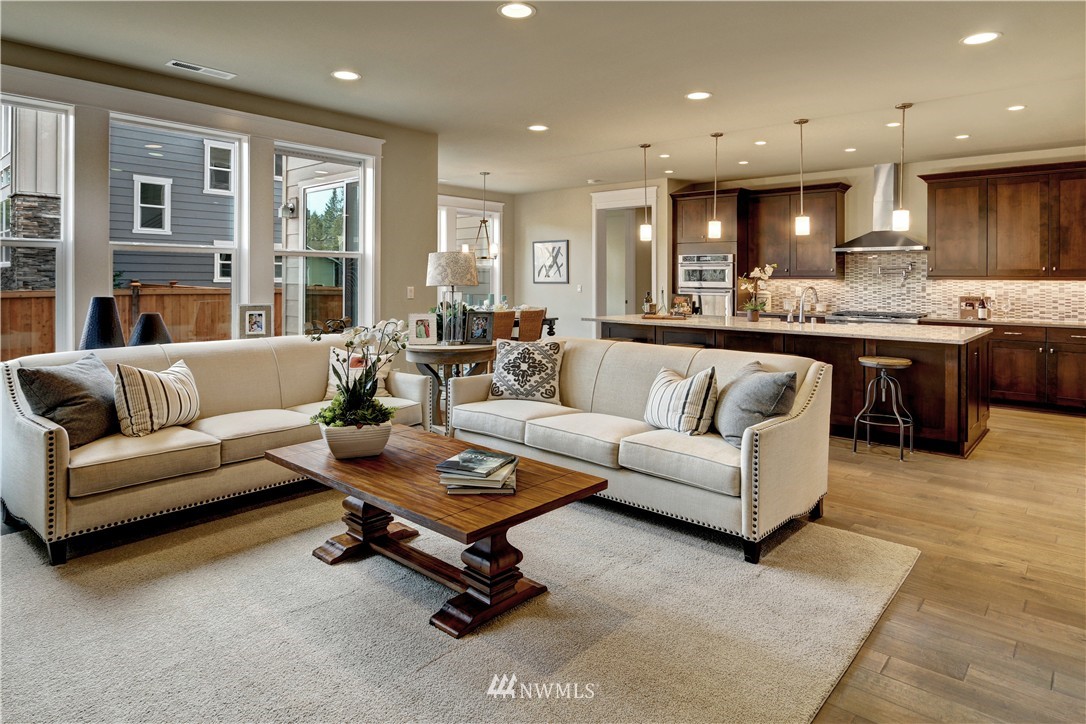 329 Field Place Southeast Renton, WA 98059 - Photo 10 of 19 a living room with furniture and a large window