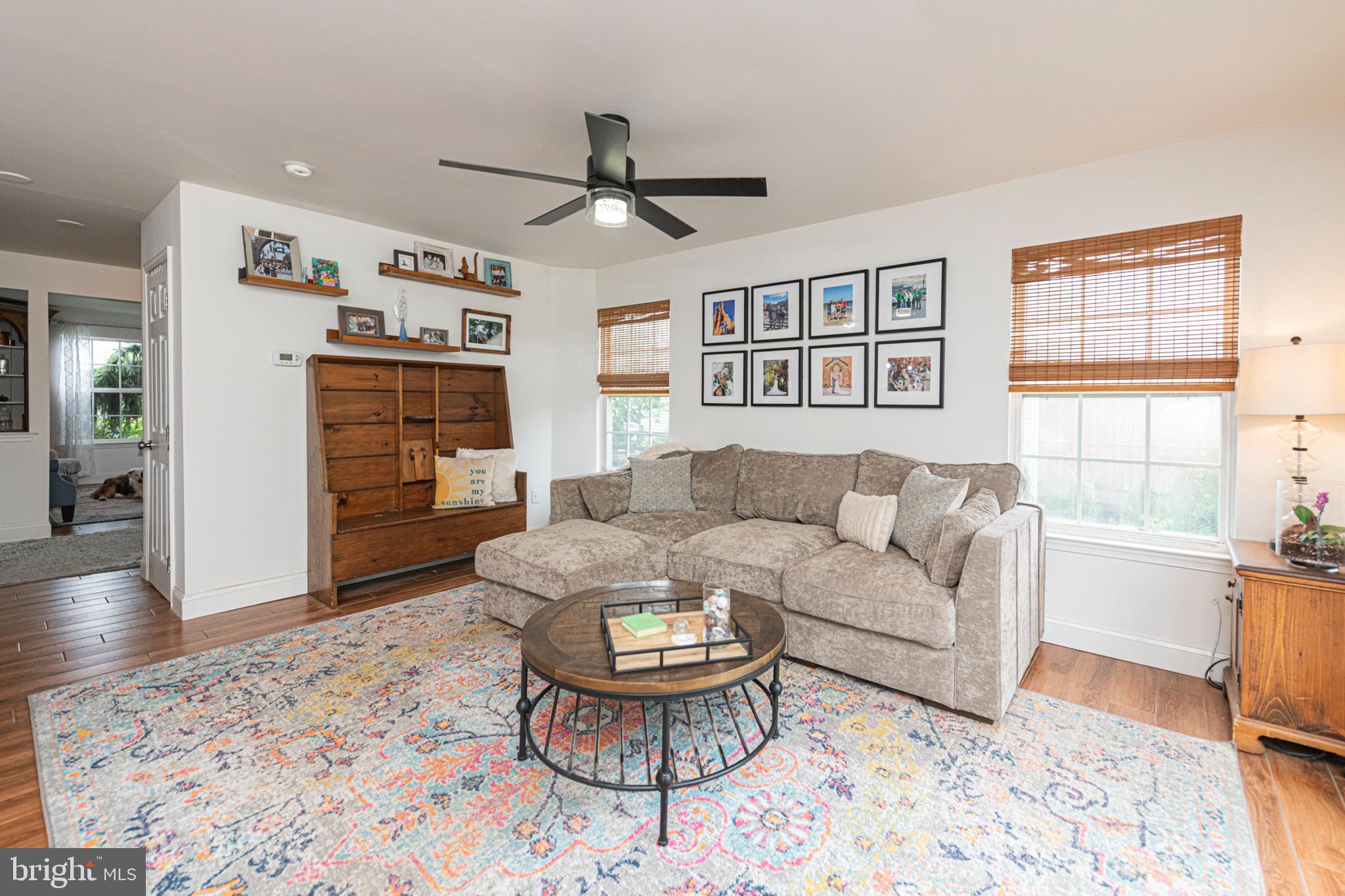 706 Melvin Road Telford, PA 18969 - Photo 13 of 55 a living room with furniture a rug and a window