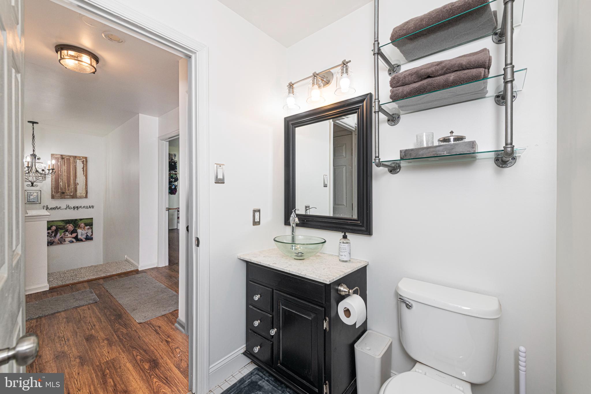 706 Melvin Road Telford, PA 18969 - Photo 28 of 55 a bathroom with a sink a toilet and shower