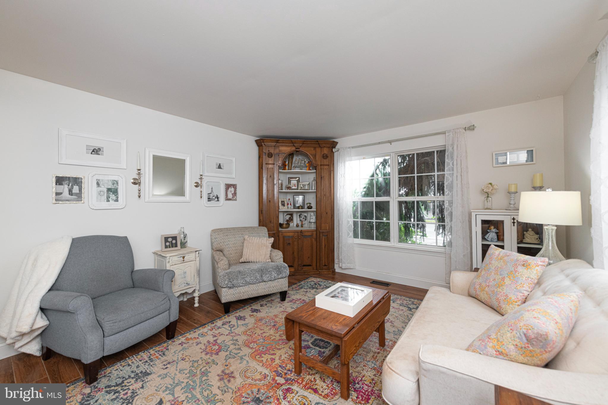 706 Melvin Road Telford, PA 18969 - Photo 8 of 55 a living room with furniture and a window