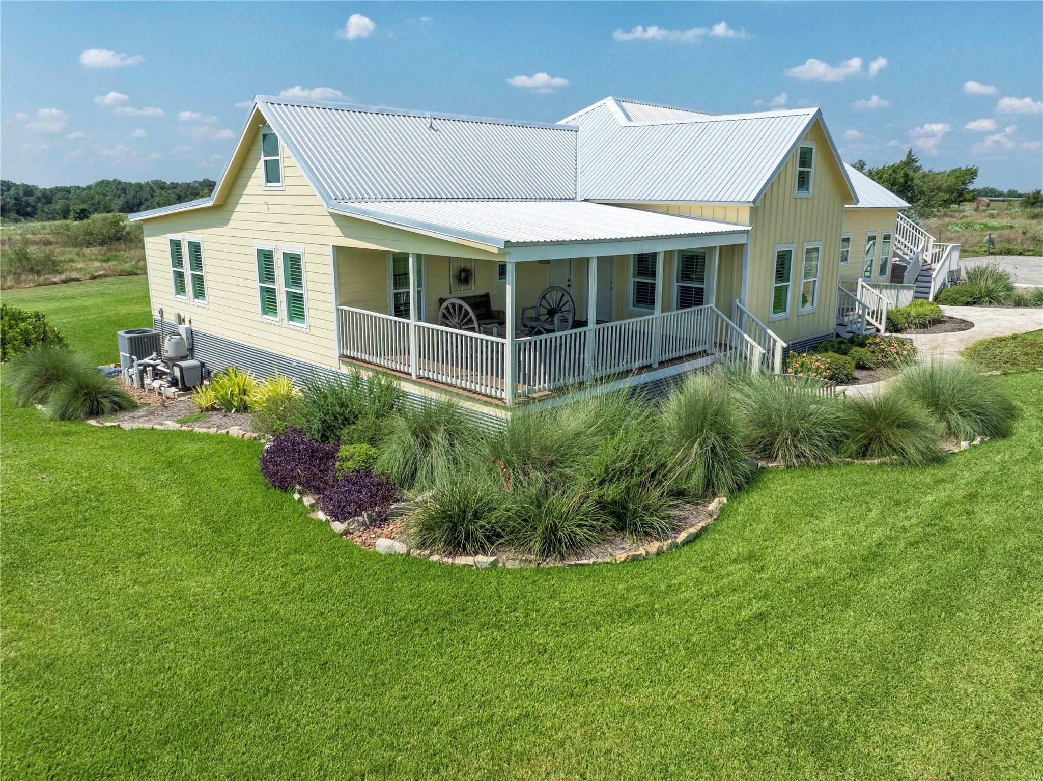 2210 Fm 615 Schulenburg, TX 78956 - Photo 15 of 49 a front view of a house with a garden