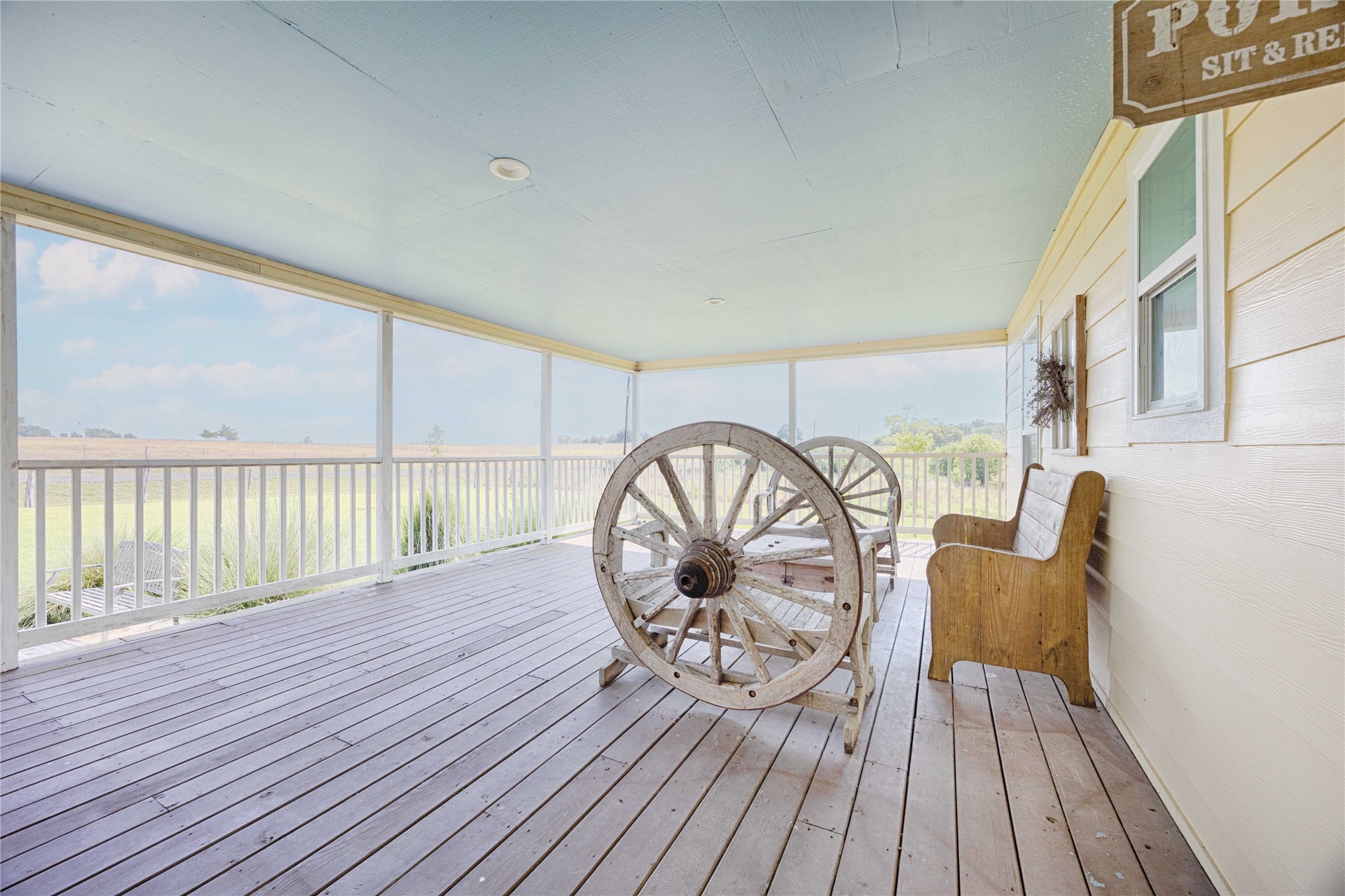 2210 Fm 615 Schulenburg, TX 78956 - Photo 16 of 49 wooden floor with a balcony