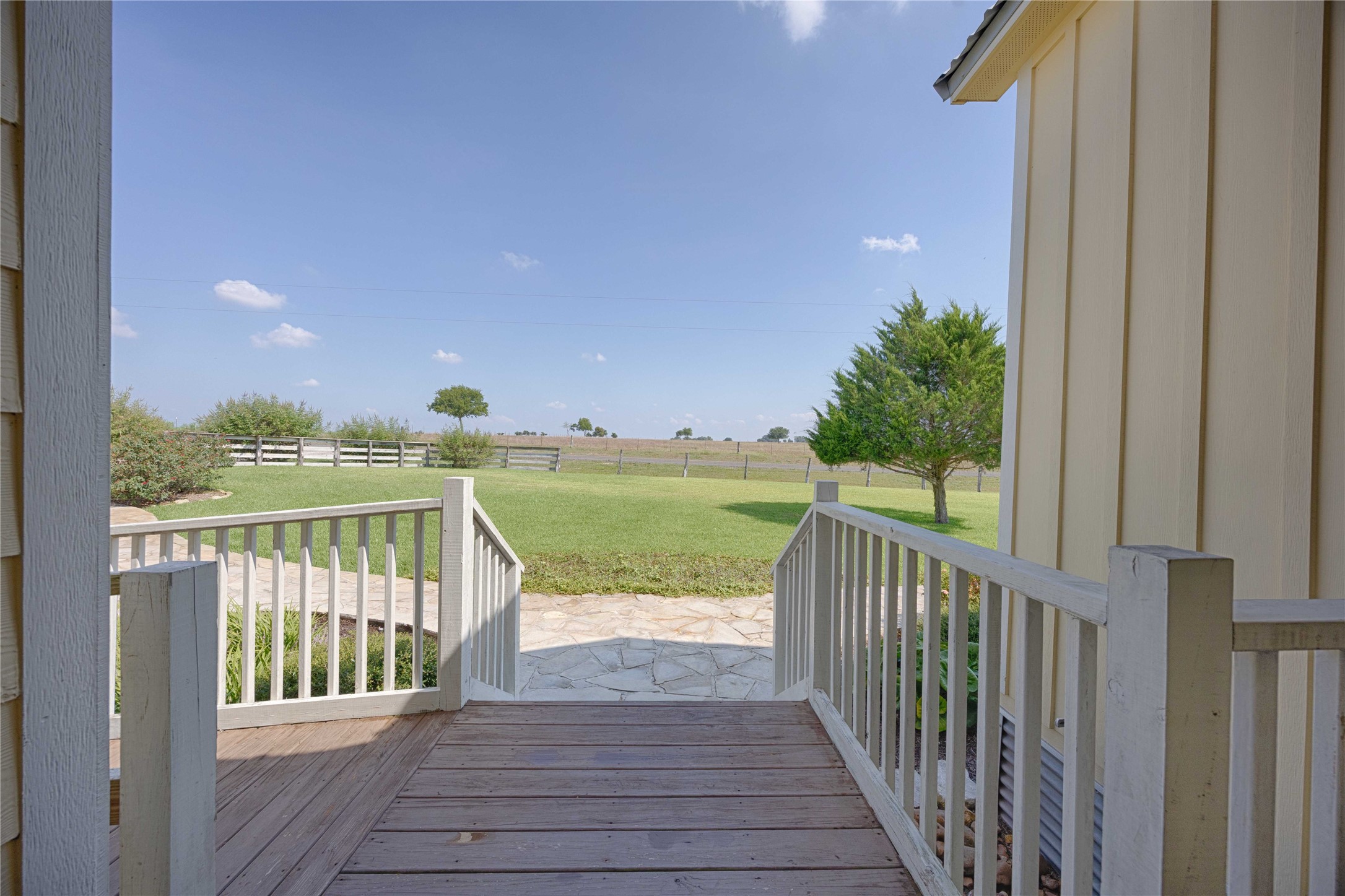 2210 Fm 615 Schulenburg, TX 78956 - Photo 18 of 49 a view of balcony with wooden floor & fence