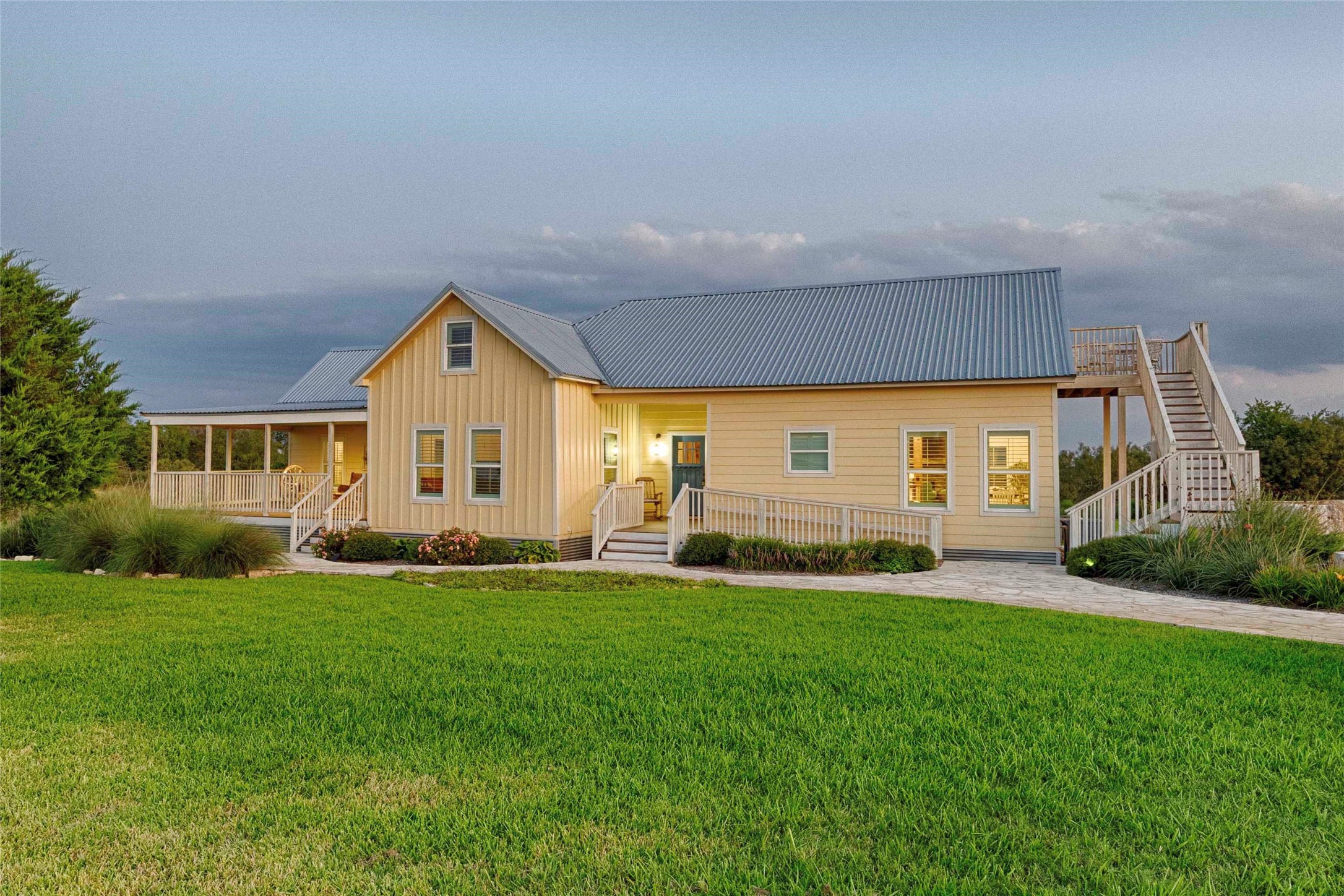 2210 Fm 615 Schulenburg, TX 78956 - Photo 2 of 49 a front view of a house with a yard and garage