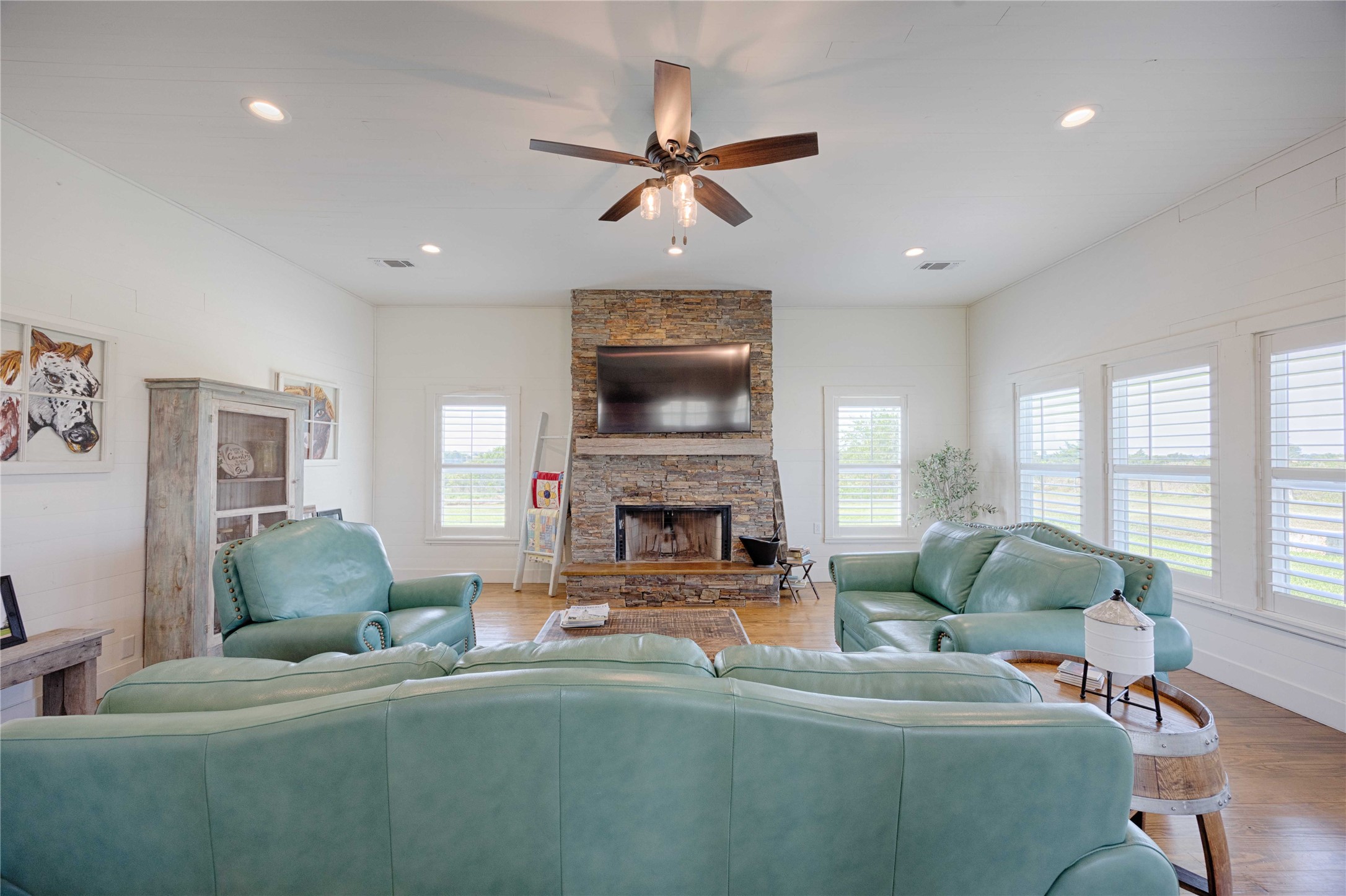 2210 Fm 615 Schulenburg, TX 78956 - Photo 23 of 49 a living room with furniture a fireplace and a large window