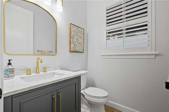 a bathroom with a sink and a toilet