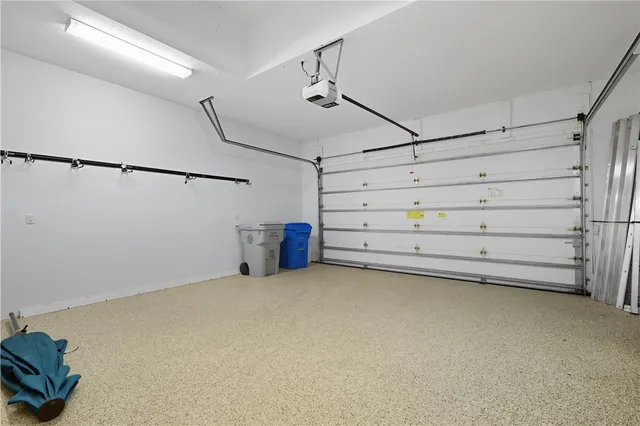 a view of an empty room with storage