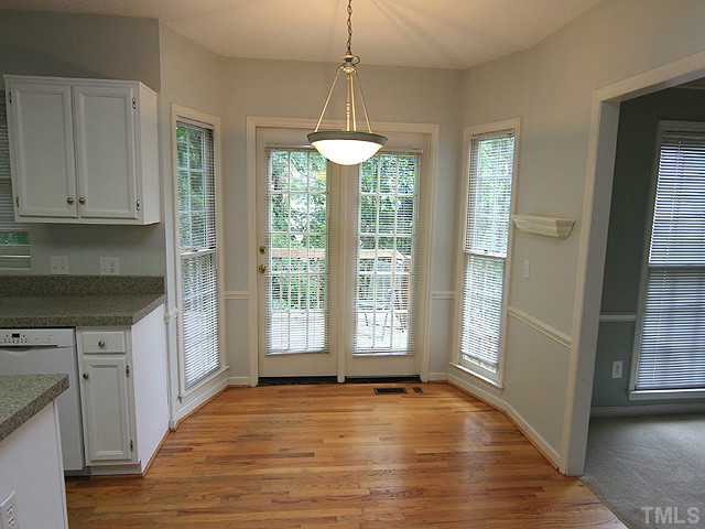 4000 Kettering Drive Durham, NC 27713 - Photo 5 of 12 Hardwood Floors and bay window overlooking the deck.