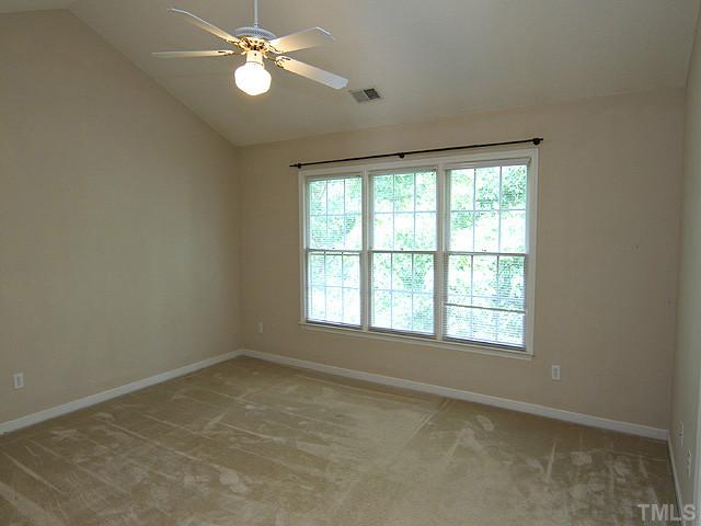 4000 Kettering Drive Durham, NC 27713 - Photo 7 of 12 Large Master Bedroom features cathedral ceiling, ceiling fan, and lots of light!