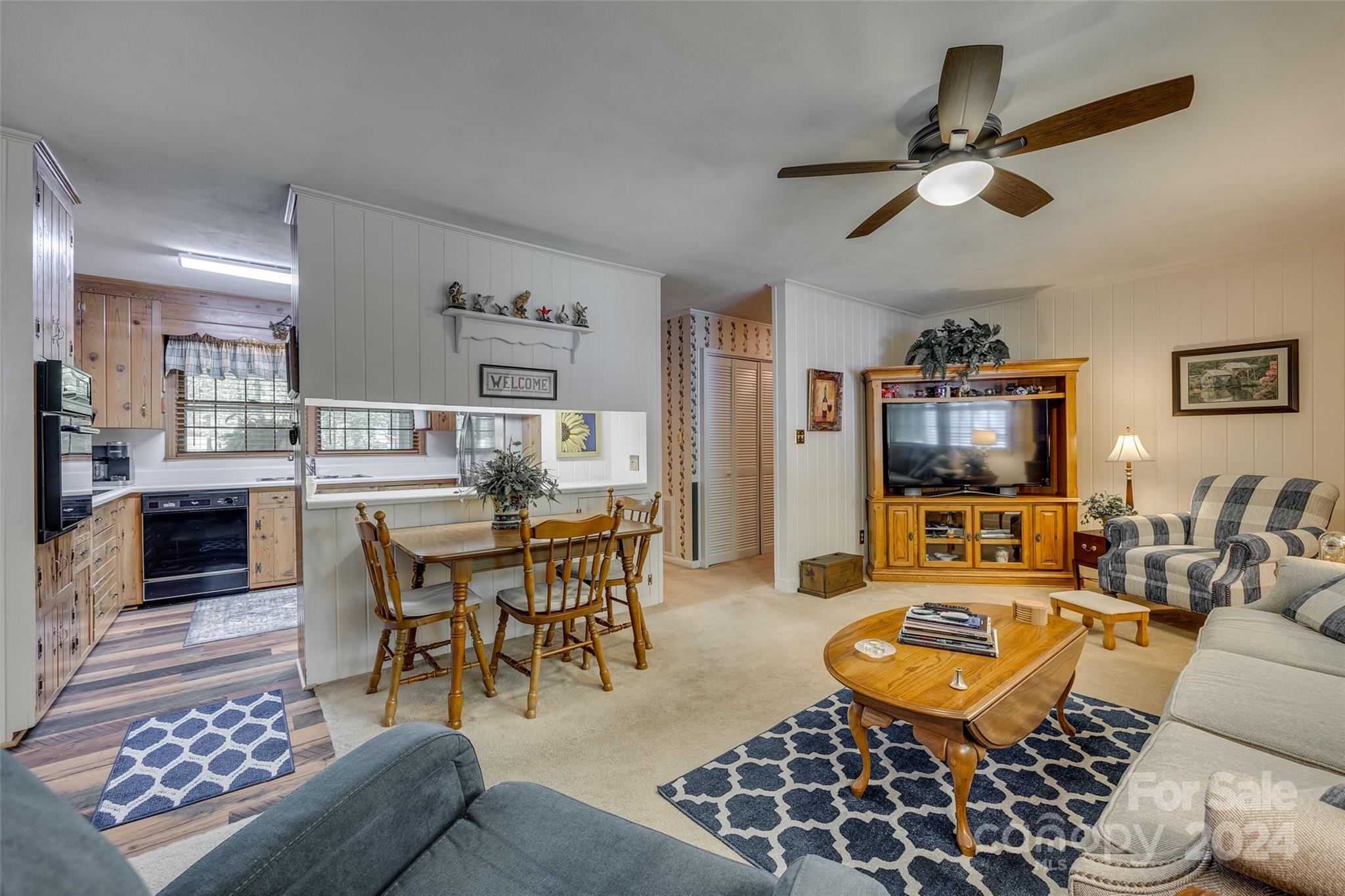 812 Lakeside Circle Lancaster, SC 29720 - Photo 12 of 32 a living room with furniture and a view of kitchen