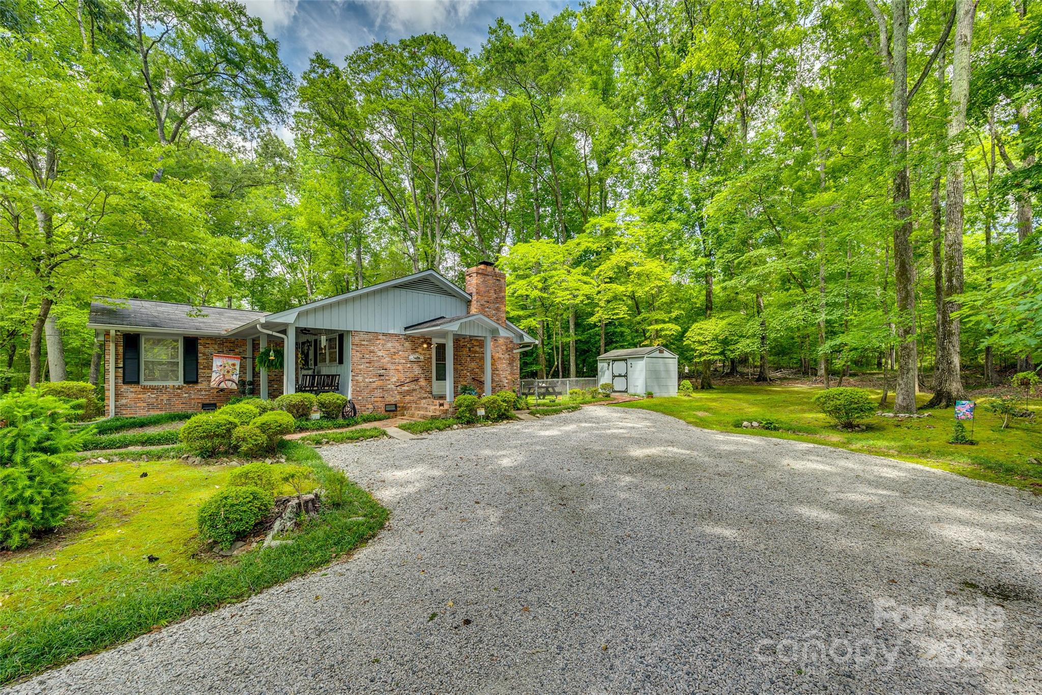 812 Lakeside Circle Lancaster, SC 29720 - Photo 2 of 32 a view of a house with backyard and a large tree