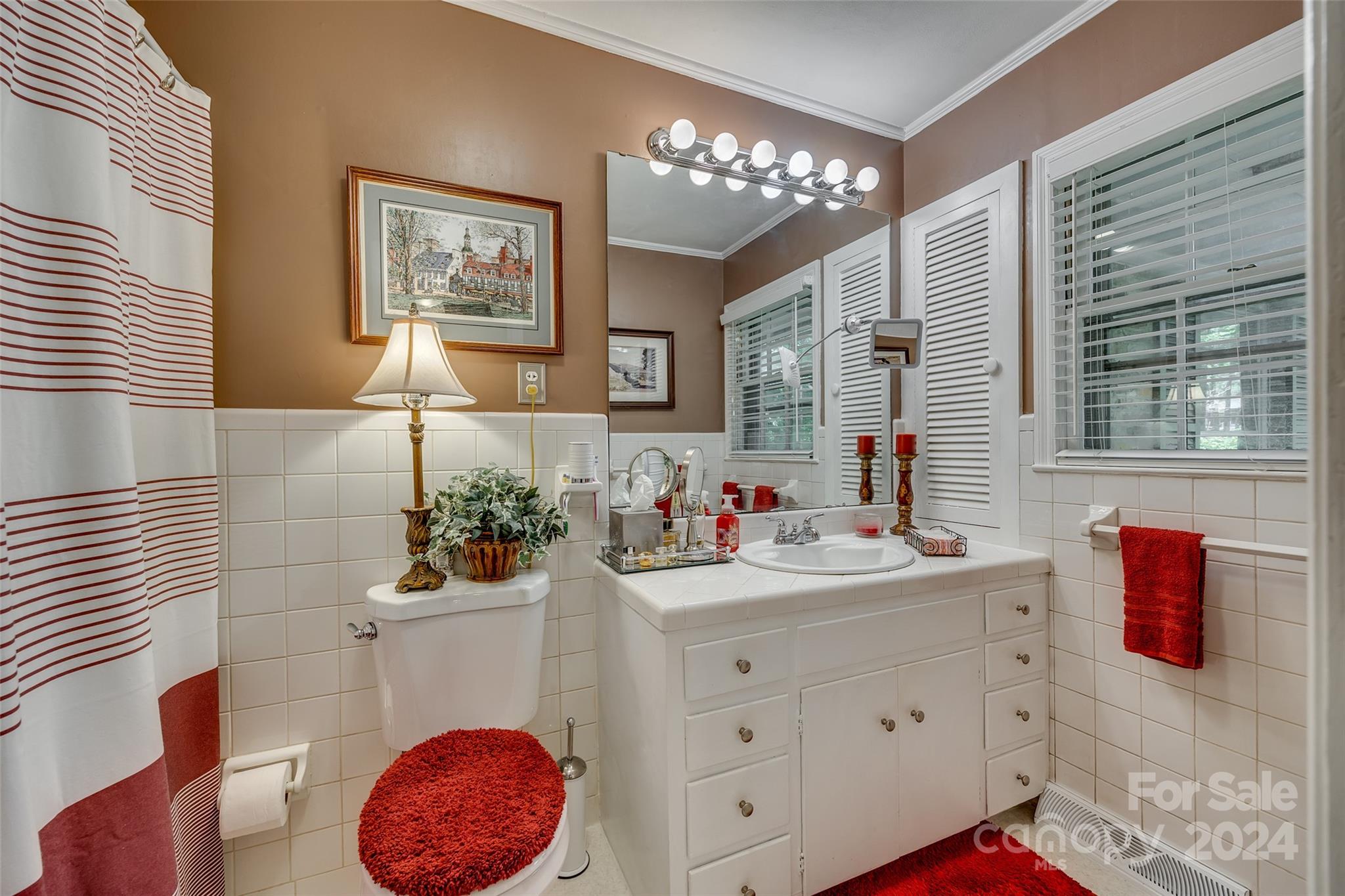 812 Lakeside Circle Lancaster, SC 29720 - Photo 21 of 32 a bathroom with a sink vanity mirror and toilet