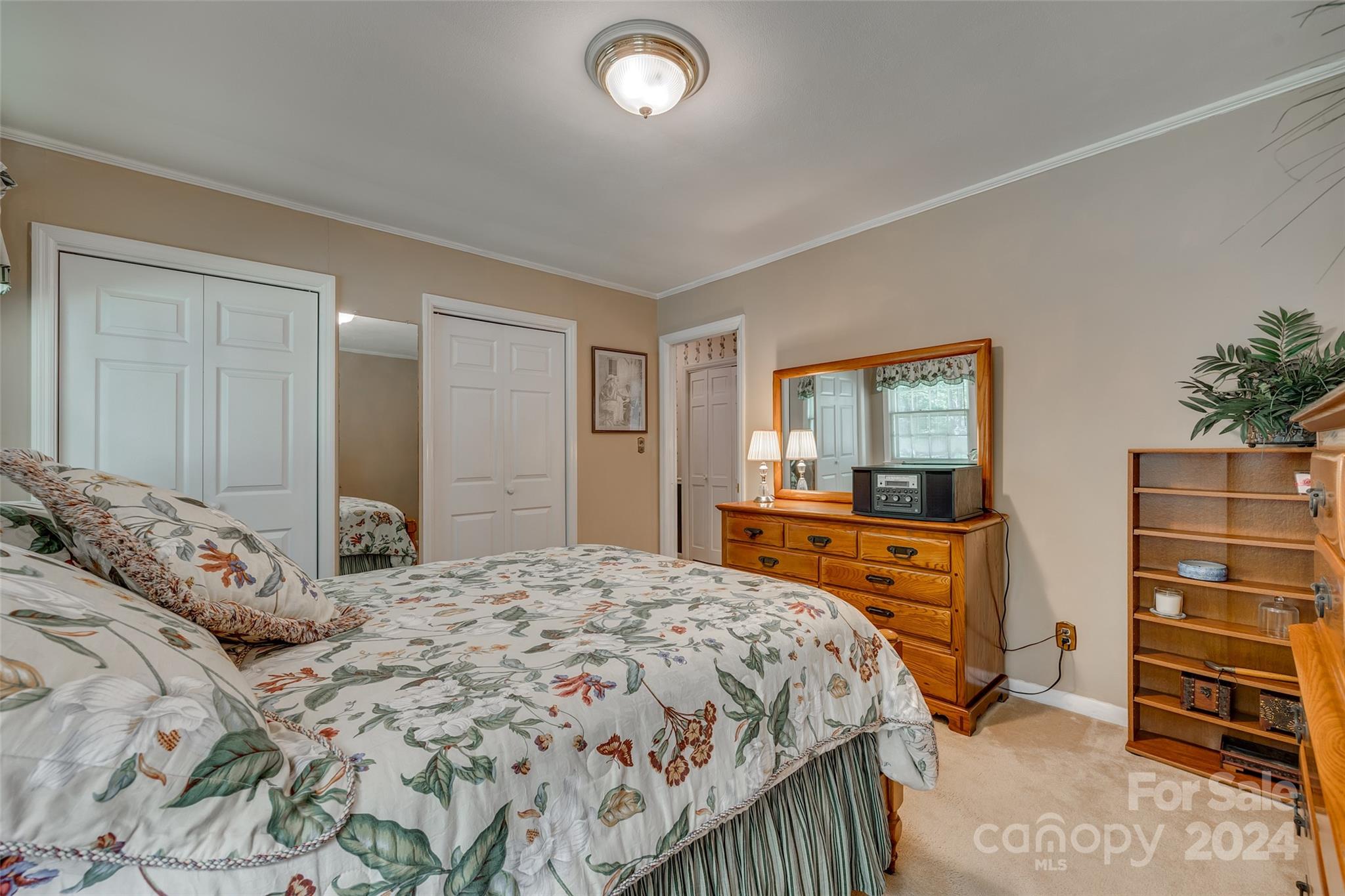 812 Lakeside Circle Lancaster, SC 29720 - Photo 23 of 32 a bedroom with a bed and a dresser
