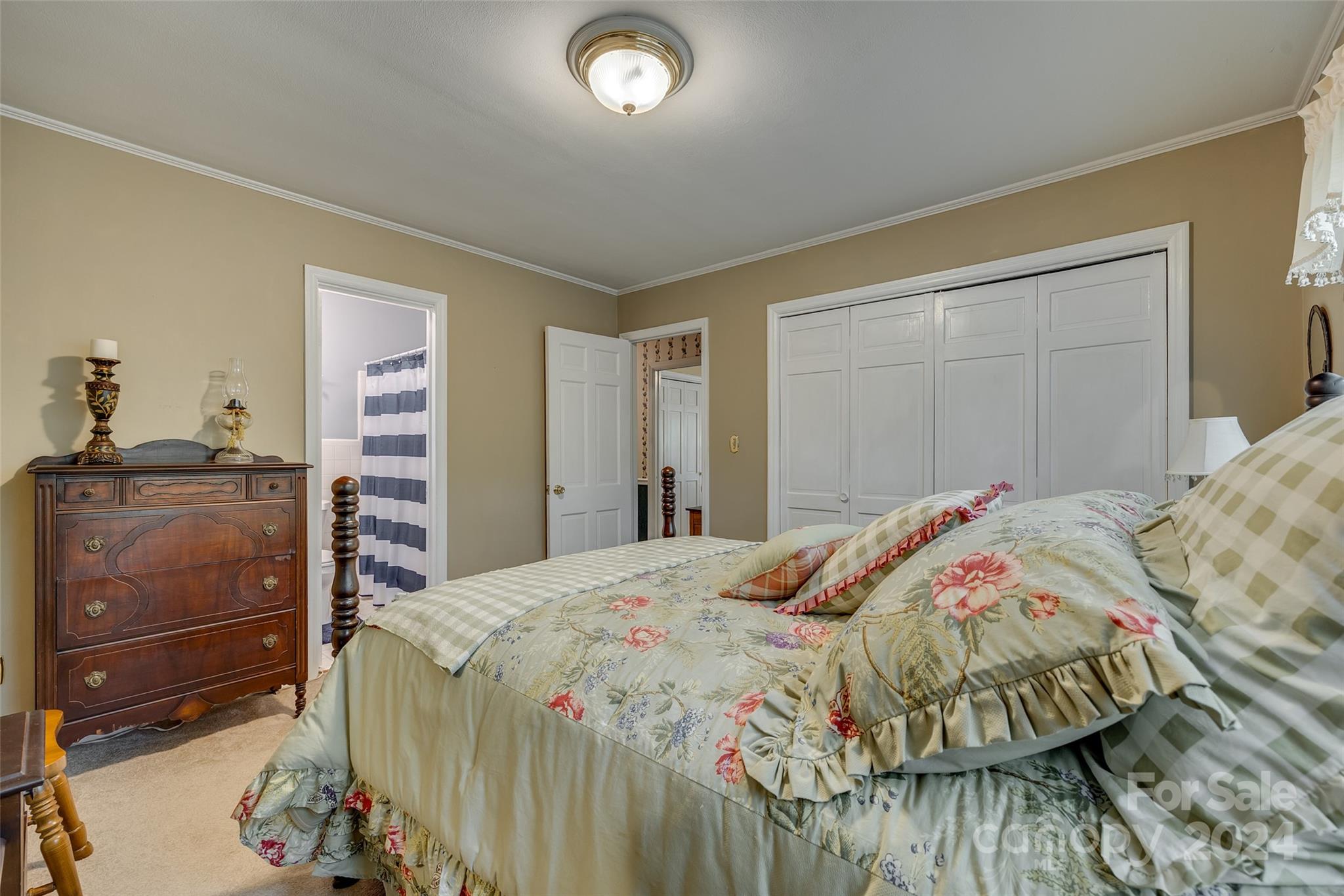 812 Lakeside Circle Lancaster, SC 29720 - Photo 26 of 32 a bedroom with a bed and a dresser