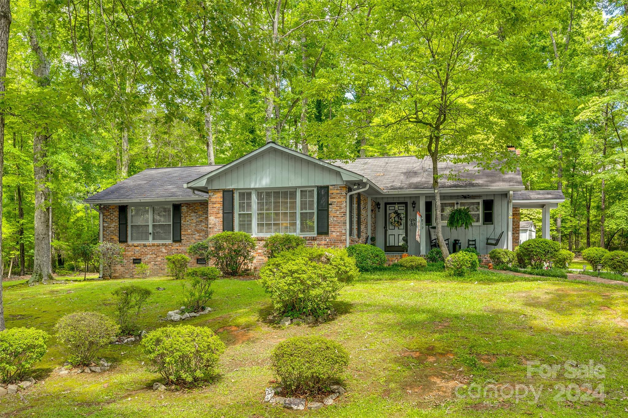 812 Lakeside Circle Lancaster, SC 29720 - Photo 3 of 32 a front view of a house with garden