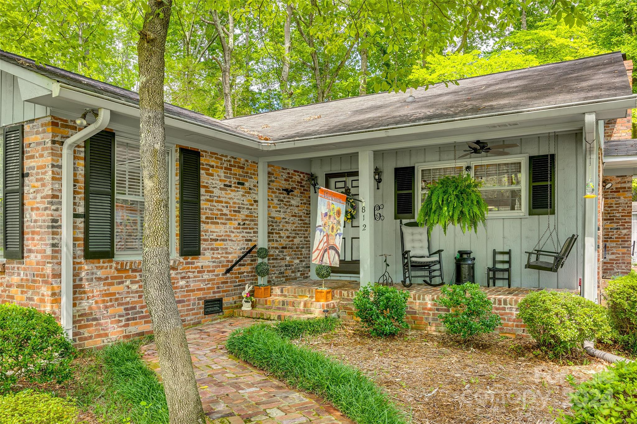 812 Lakeside Circle Lancaster, SC 29720 - Photo 4 of 32 a front view of a house with garden