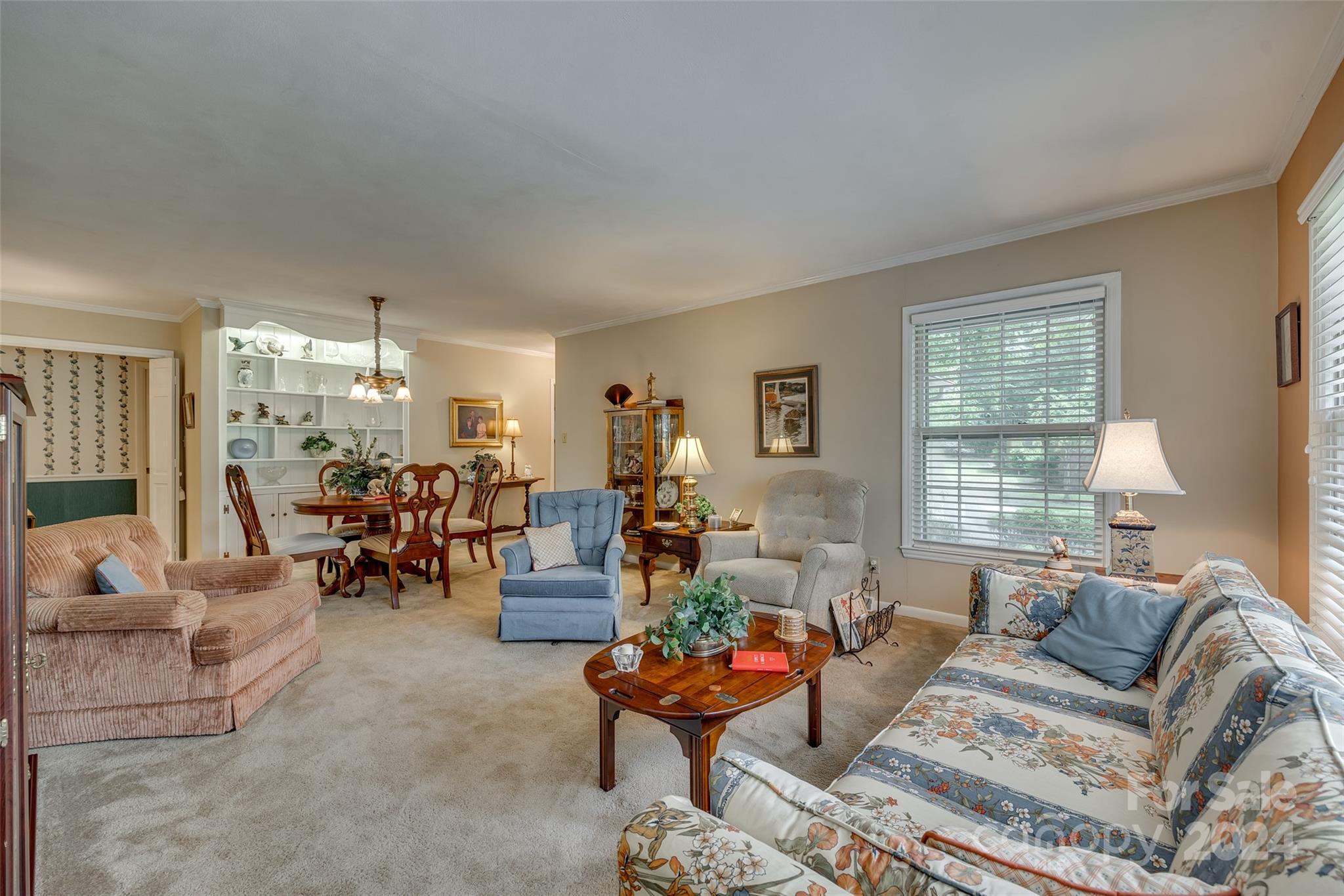 812 Lakeside Circle Lancaster, SC 29720 - Photo 9 of 32 a living room with furniture and a large window
