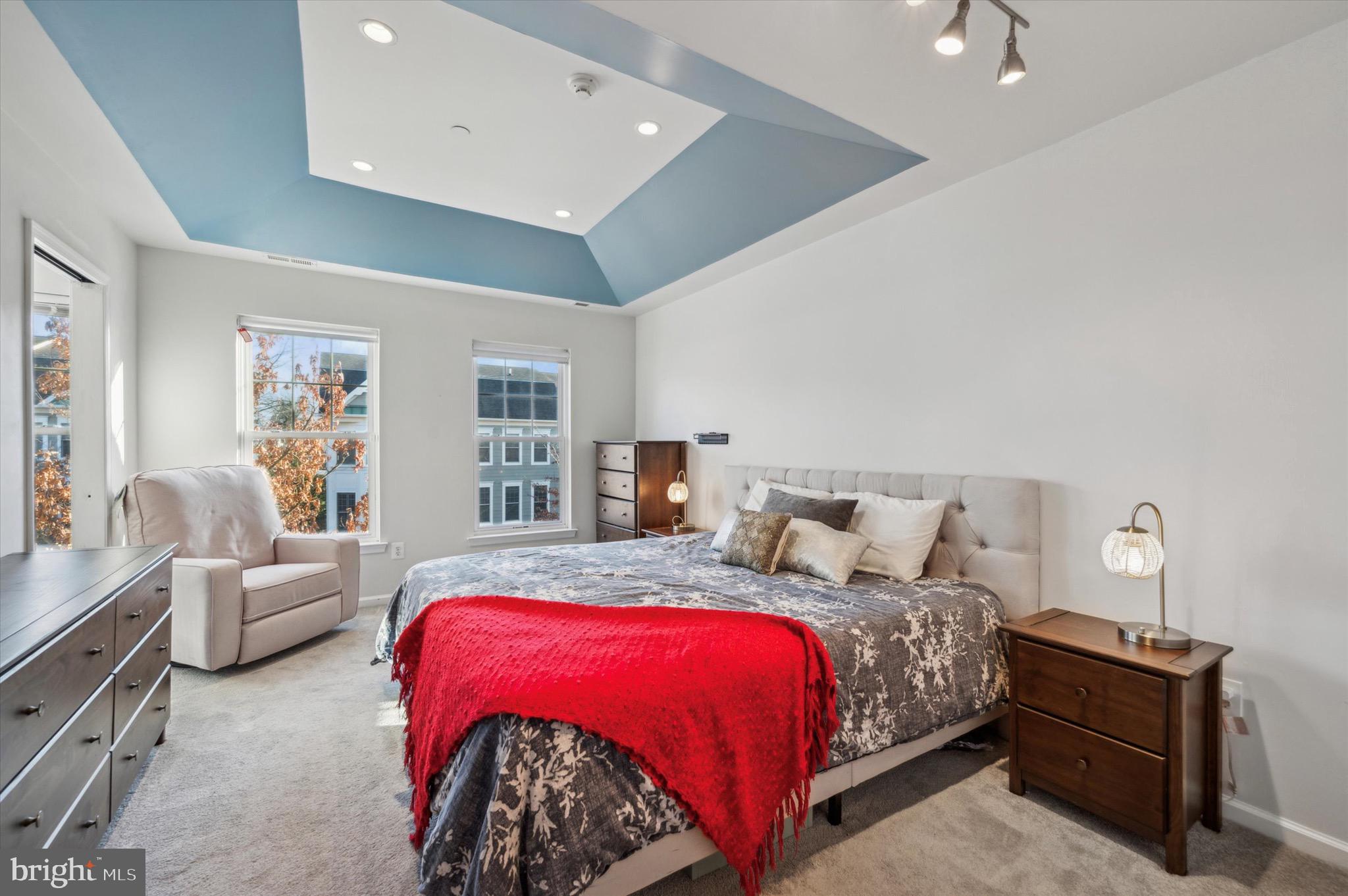 212 Cobblestone Drive Ardmore, PA 19003 - Photo 11 of 15 a bedroom with a bed and lamp