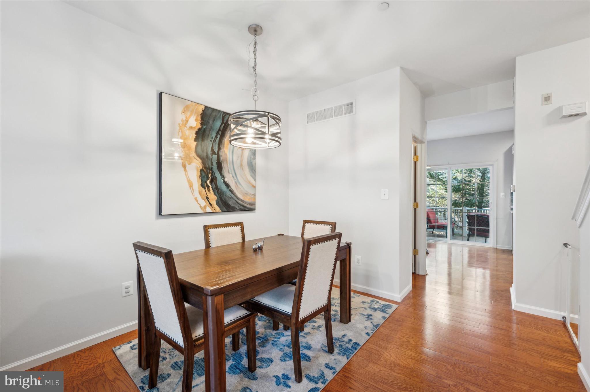 212 Cobblestone Drive Ardmore, PA 19003 - Photo 10 of 15 a view of a dining room with furniture window and wooden floor