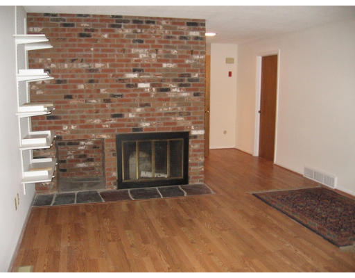 46 High Point Drive Amherst, MA 01002 - Photo 9 of 14 a view of empty room with a fireplace