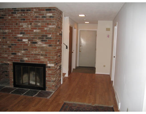 46 High Point Drive Amherst, MA 01002 - Photo 10 of 14 a view of an empty room and fire place