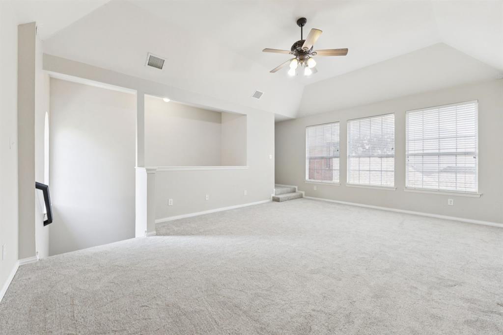 7913 Morningdew Drive Plano, TX 75025 - Photo 38 of 40 a view of an empty room with a window