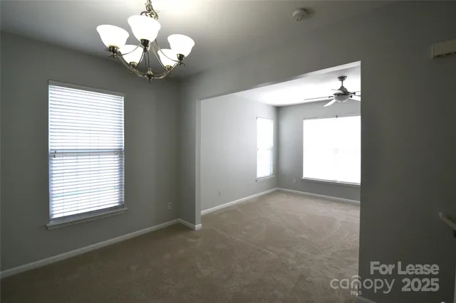 a bathroom with a sink toilet and a mirror