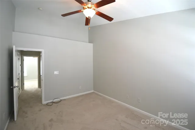 a bathroom with a tub sink shower and a mirror