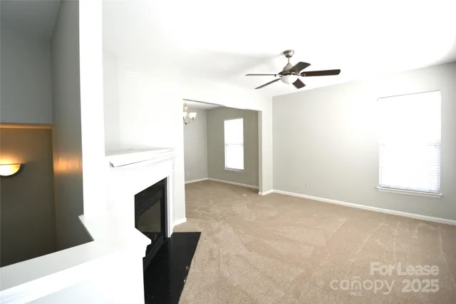a view of a livingroom with a fireplace