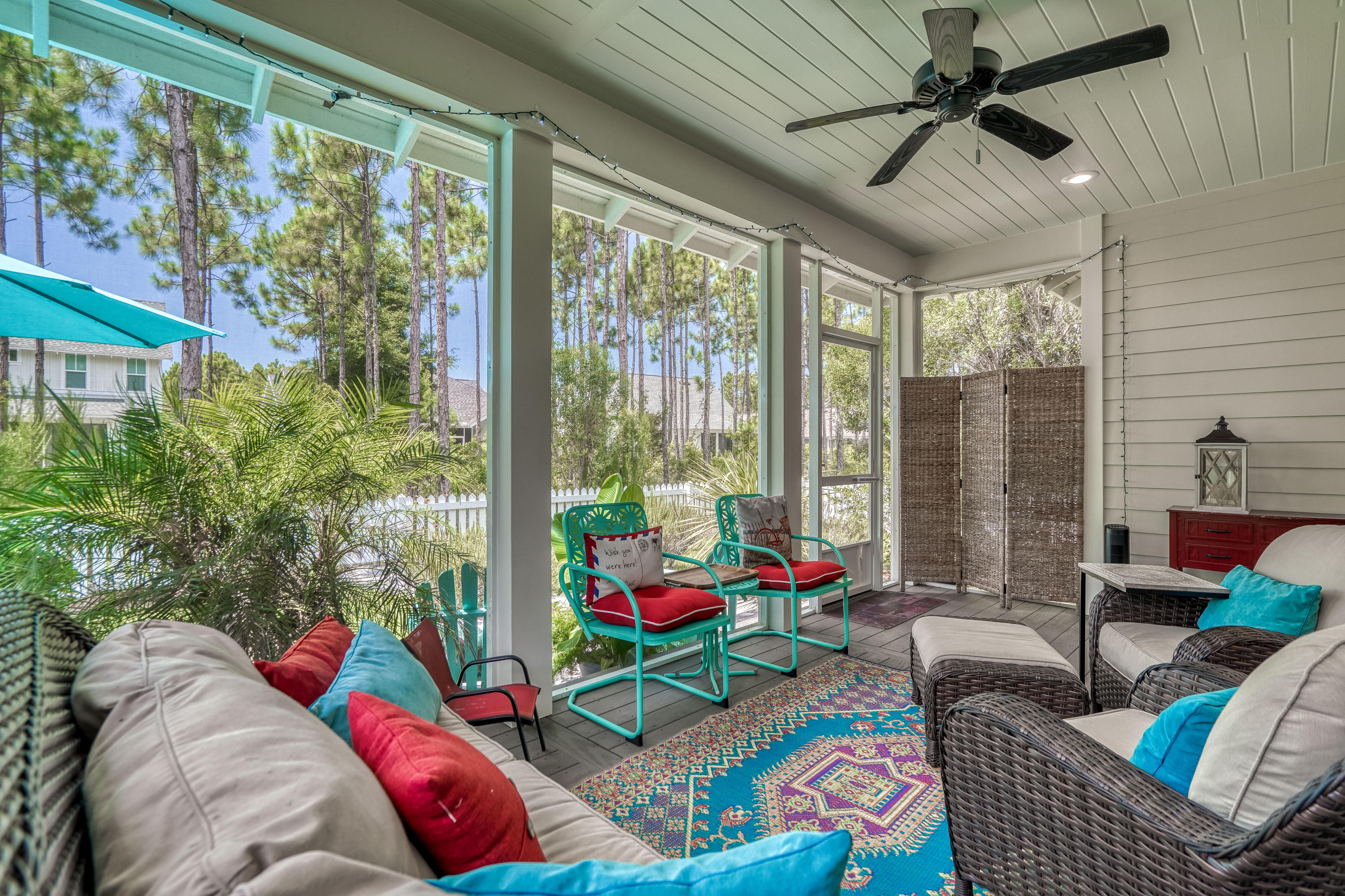 137 Jack Knife Drive Inlet Beach, FL 32461 - Photo 14 of 45 a living room with patio furniture and a floor to ceiling window
