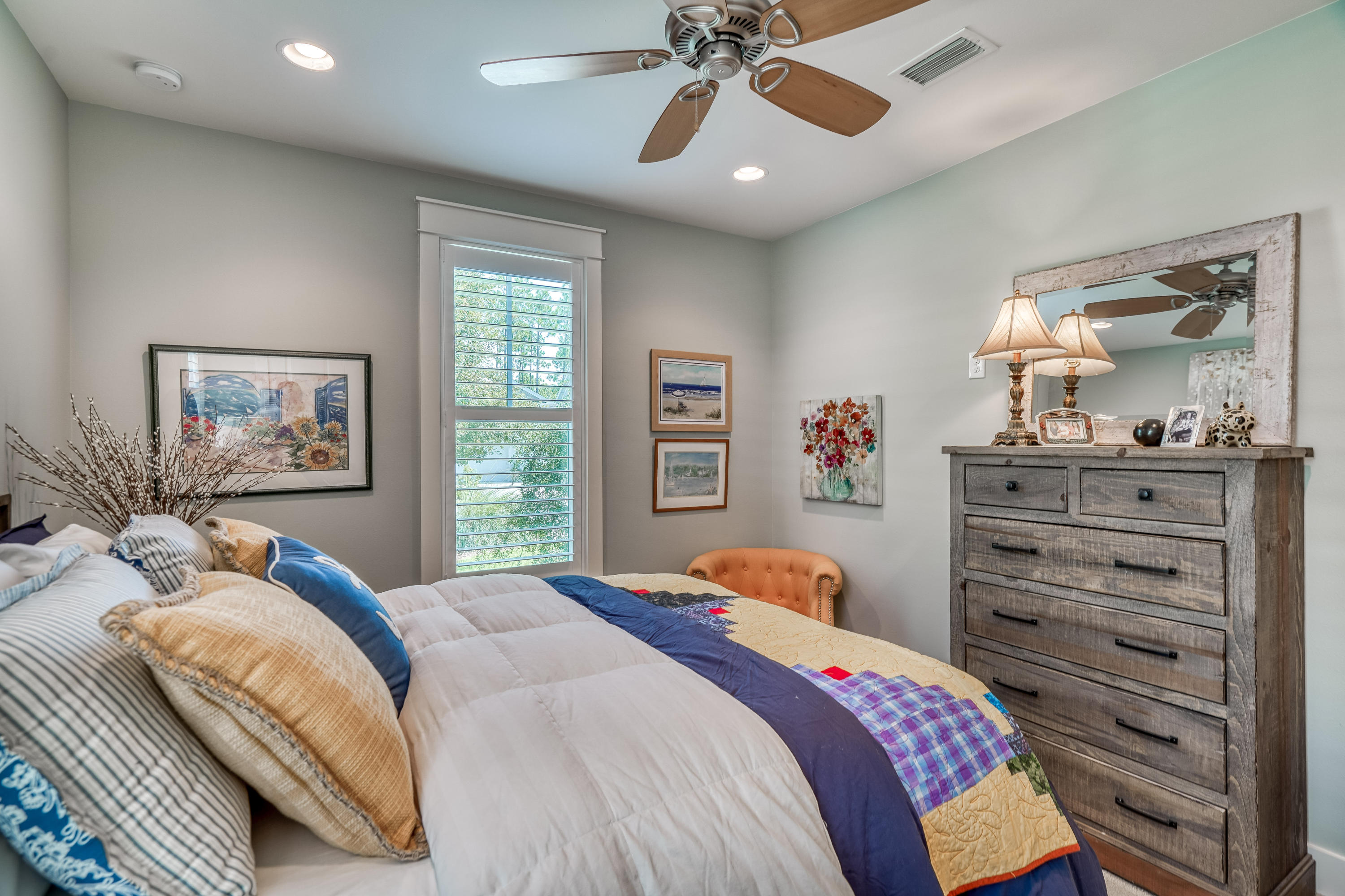 137 Jack Knife Drive Inlet Beach, FL 32461 - Photo 17 of 45 a bedroom with a bed and a chandelier