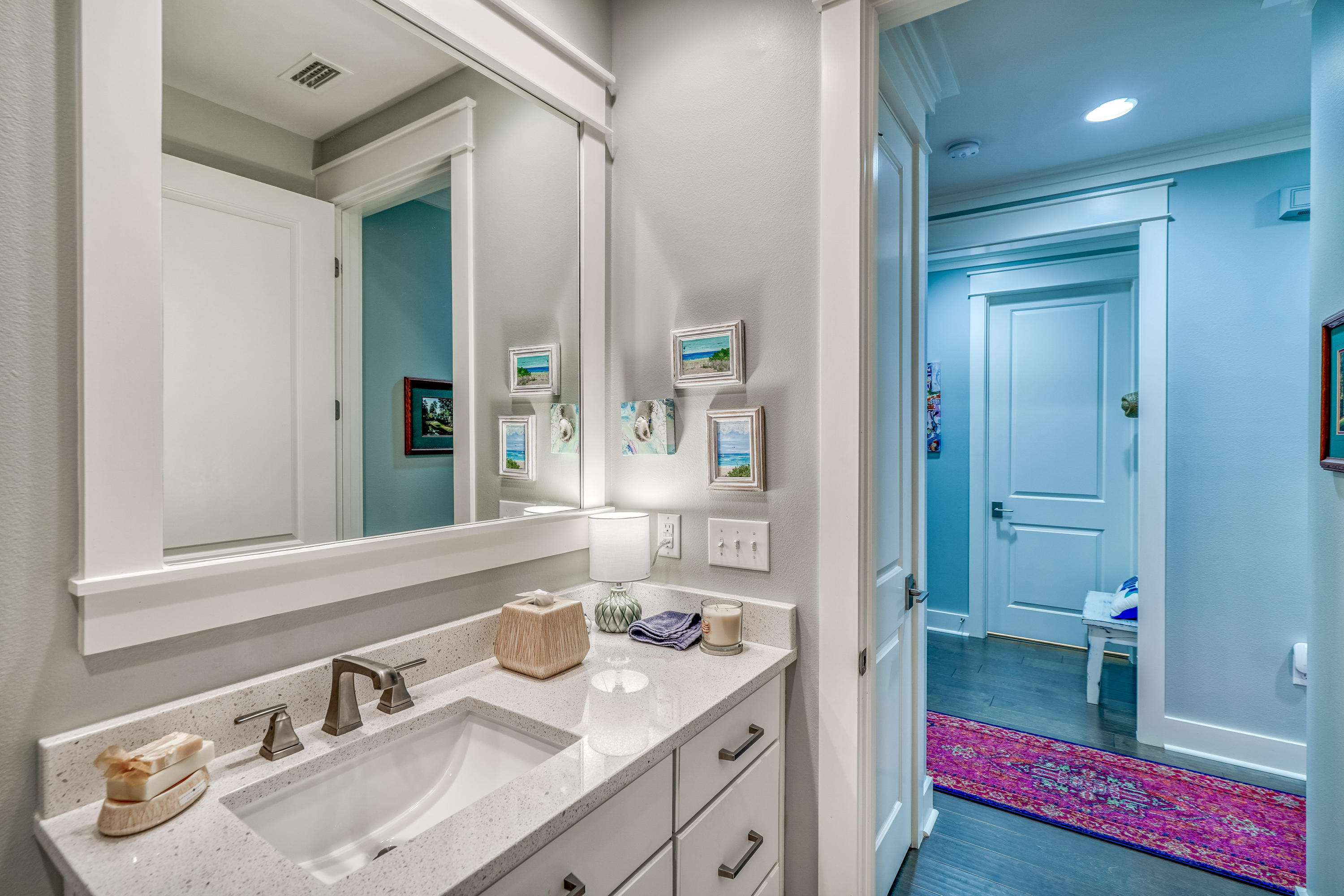 137 Jack Knife Drive Inlet Beach, FL 32461 - Photo 20 of 45 a en suite bathroom with a sink and a mirror