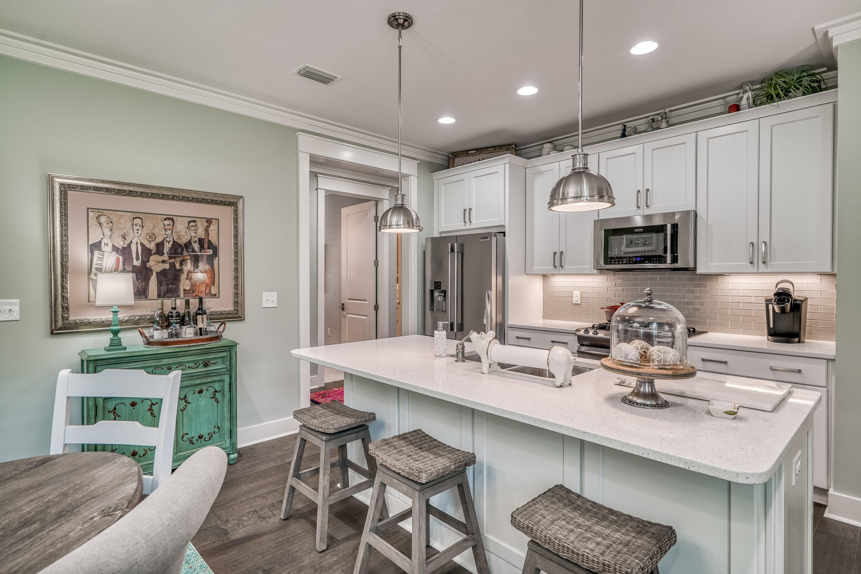 137 Jack Knife Drive Inlet Beach, FL 32461 - Photo 26 of 45 a kitchen with stainless steel appliances kitchen island granite countertop a sink and a refrigerator
