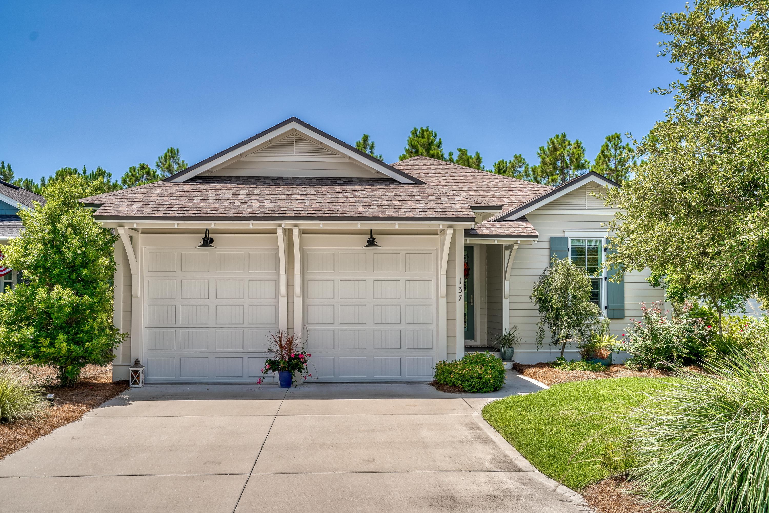 137 Jack Knife Drive Inlet Beach, FL 32461 - Photo 3 of 45 a front view of a house with garden