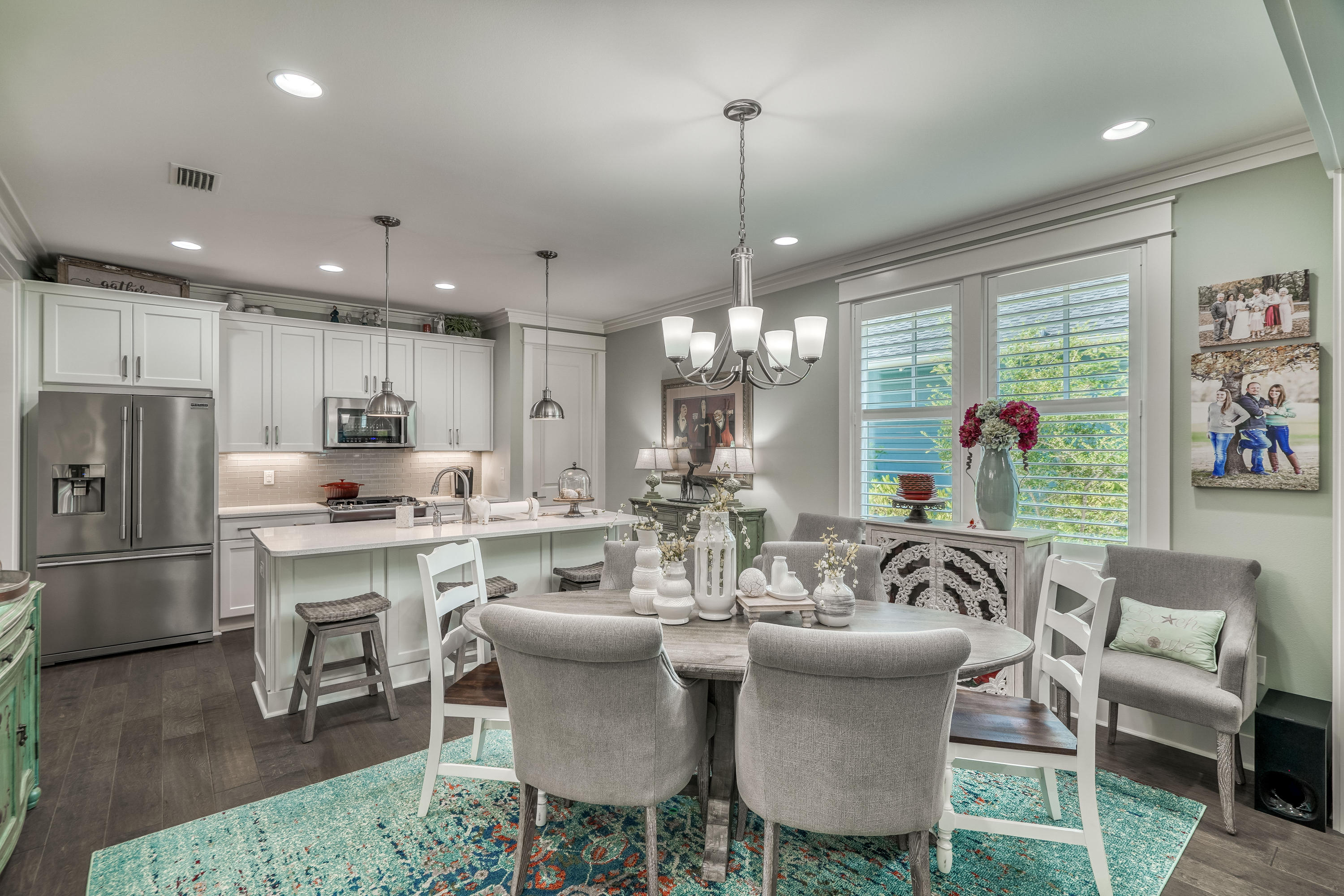 137 Jack Knife Drive Inlet Beach, FL 32461 - Photo 32 of 45 a kitchen with kitchen island stainless steel appliances a dining table chairs sink and cabinets