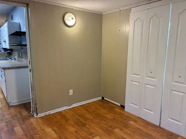 a view of a storage & utility room with a sink