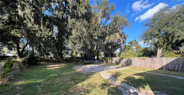 a view of backyard with green space