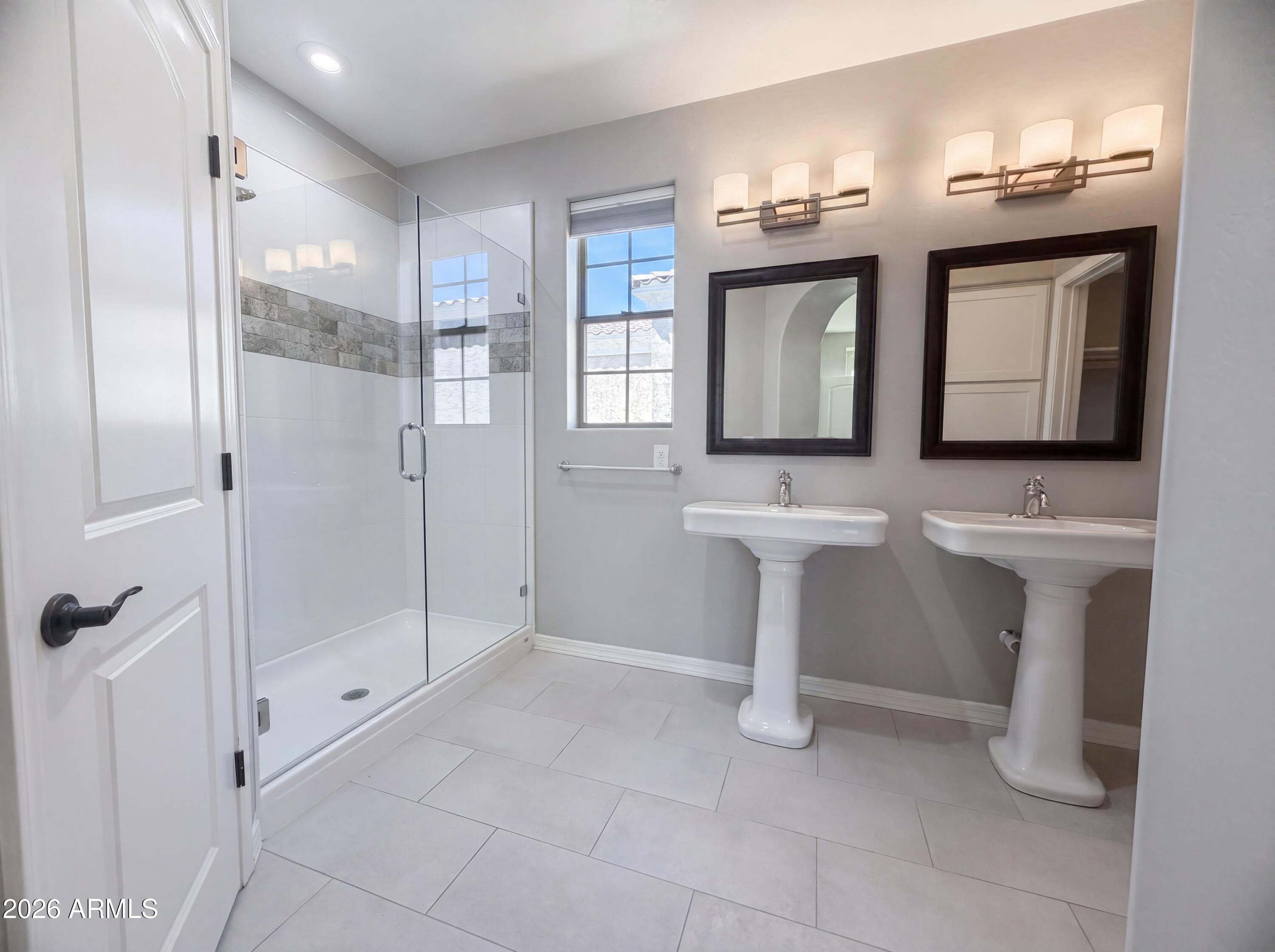 1729 South Desert View Place Apache Junction, AZ 85120 - Photo 10 of 17 a bathroom with a sink a toilet and mirror