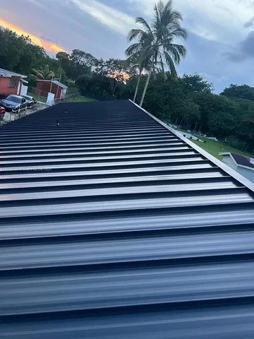 a outdoor view of a house with a deck
