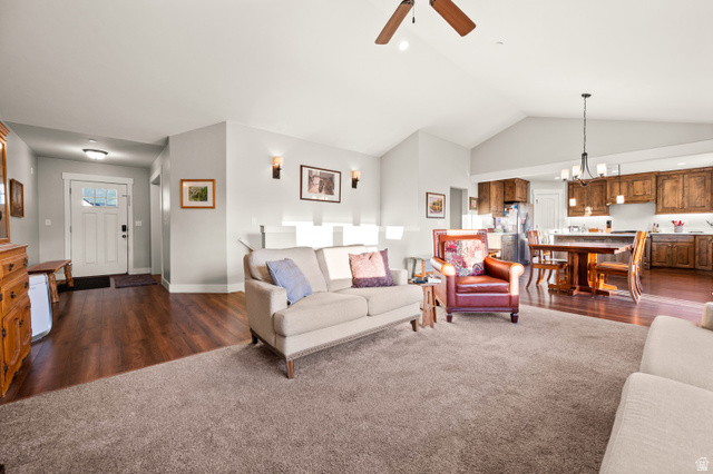1145 North Christley Lane, Unit 48 Elk Ridge, UT 84651 - Photo 11 of 38 Open-concept living area featuring vaulted ceilings, a ceiling fan, and recessed lighting