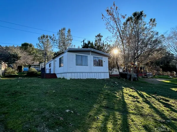 a view of a backyard with a garden